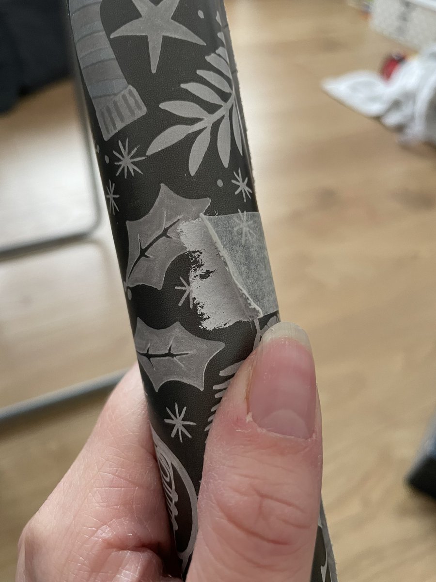 Jenla88's tweet photo. can you rethink your tape on your wrapping paper next time, theres four bits that wont easily come off without wasting some paper @nextofficial https://t.co/eVJ4h2pRri