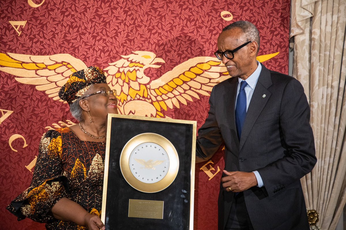 UrugwiroVillage's tweet photo. Earlier this week at the American Academy of Achievement, President Kagame received the 2022 Outstanding African Leadership Award for exemplary Covid-19 response. He also presented the Golden Plate Award to President @Macky_Sall &amp; WTO DG @NOIweala as a 2017 recipient himself. https://t.co/o67mHvKhqm