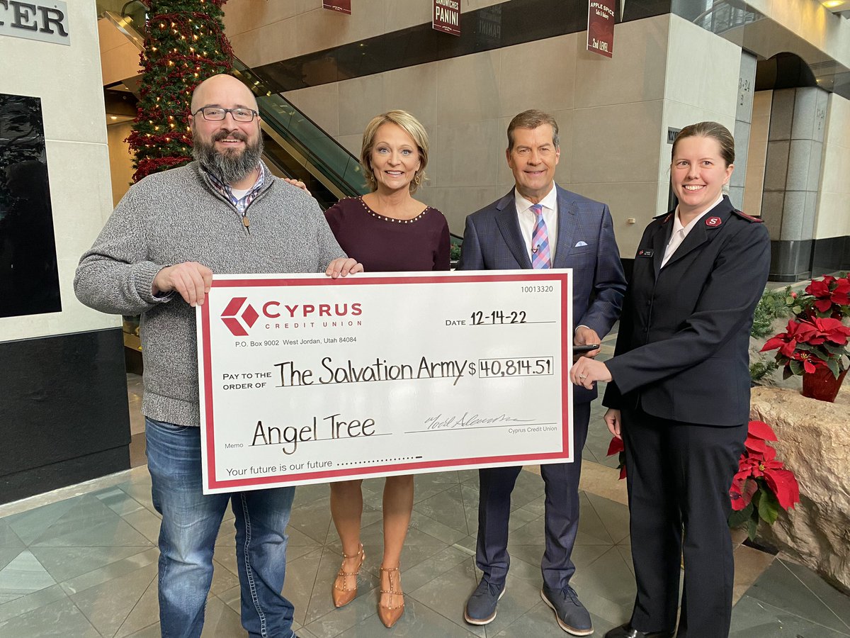 SalArmySLC's tweet photo. David Sant from Cyprus Credit Union, joins Ron Bird &amp; Mary Nickles from @KUTV2News in presenting Lt. Kate Combs a check for $40,814 for the Angel Tree program. Cyprus has been a long time sponsor of Angel Tree and The Salvation Army is grateful for their support. https://t.co/XXQpWpZgCp