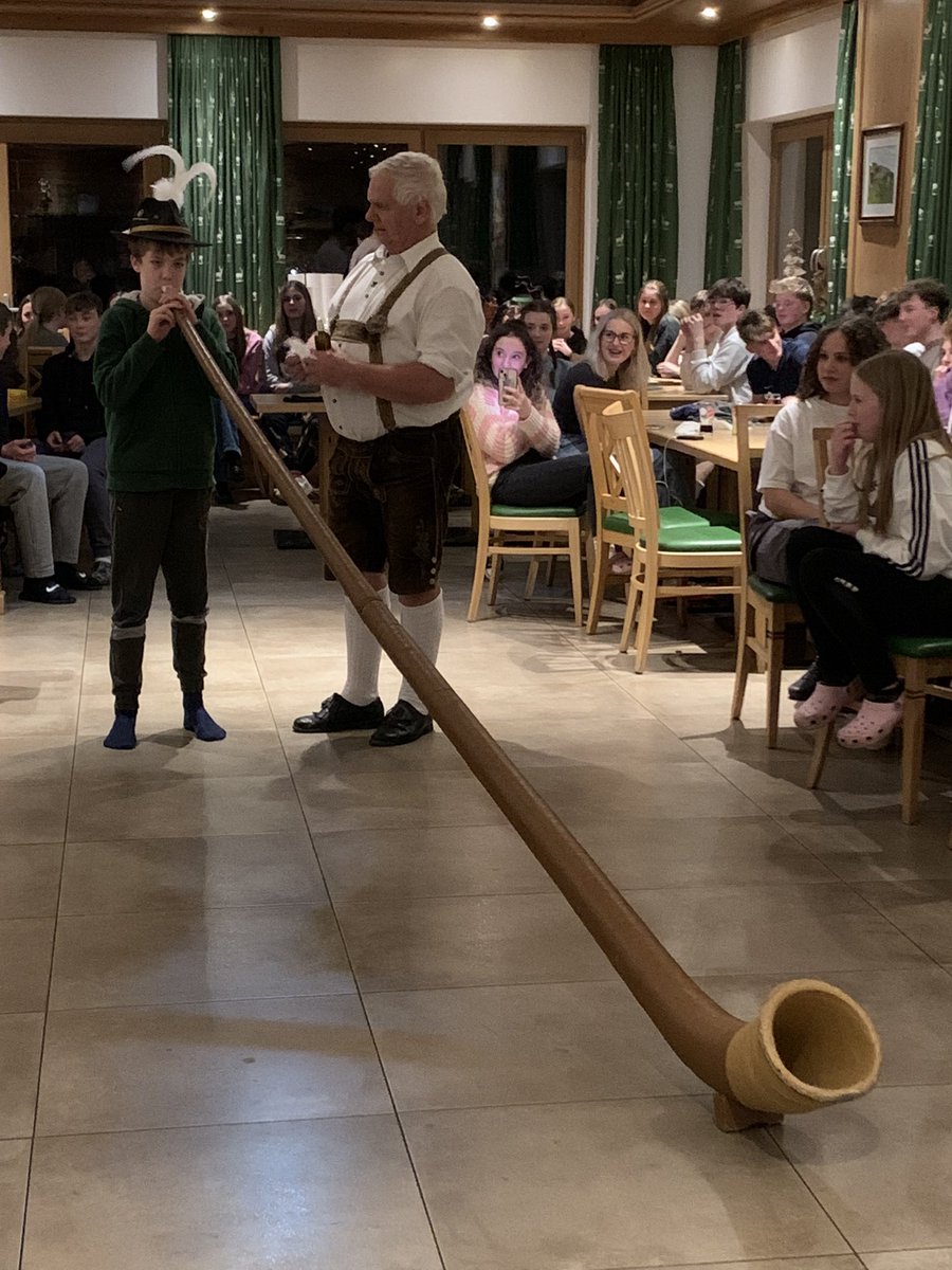 Tyrolean Evening in Zell am See proves that music, dance and performance are key in every culture. One of our young trombonists becoming a virtuoso on the Alpine horn! <a href="/crickhowellhs/">Crickhowell HS</a>