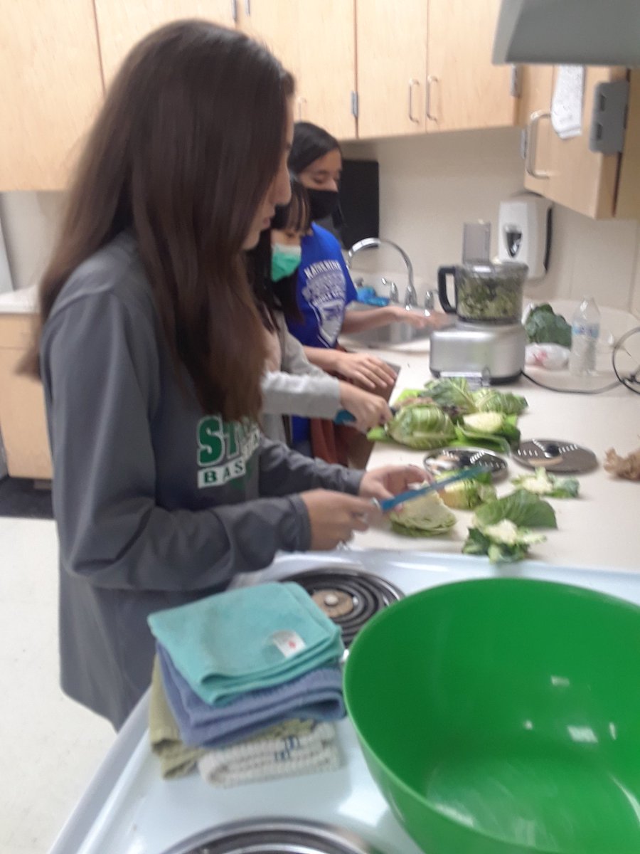 Preparing salads from the schools beautiful fall garden.