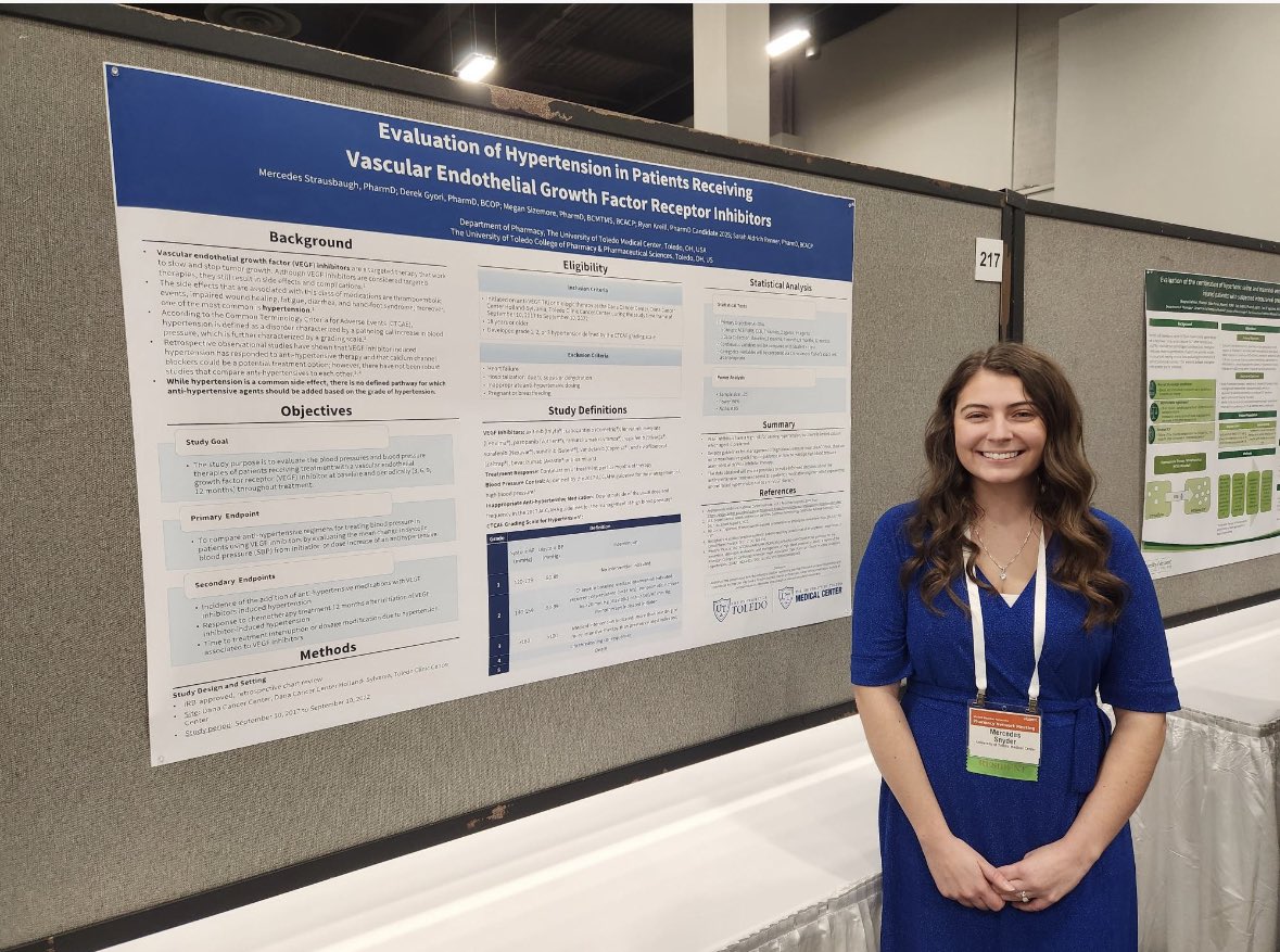 UTMC_PharmRes's tweet photo. PGY1 Resident Mercedes Strausbaugh with her poster presentation on HTN in patients receiving vascular endothelial growth factor receptor inhibitors #TwitteRx #PharmRes #ASHP22 #Midyear https://t.co/Fax62WGgMa