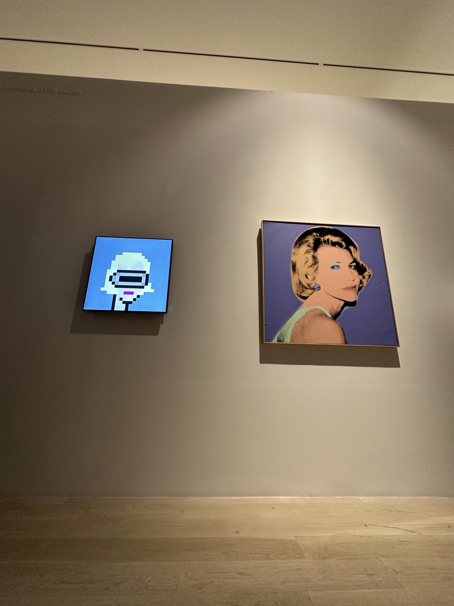 maxnorris__'s tweet image. Wow. CryptoPunk #305 hanging next to a Warhol. Big moment for the entire space. A look into the future.