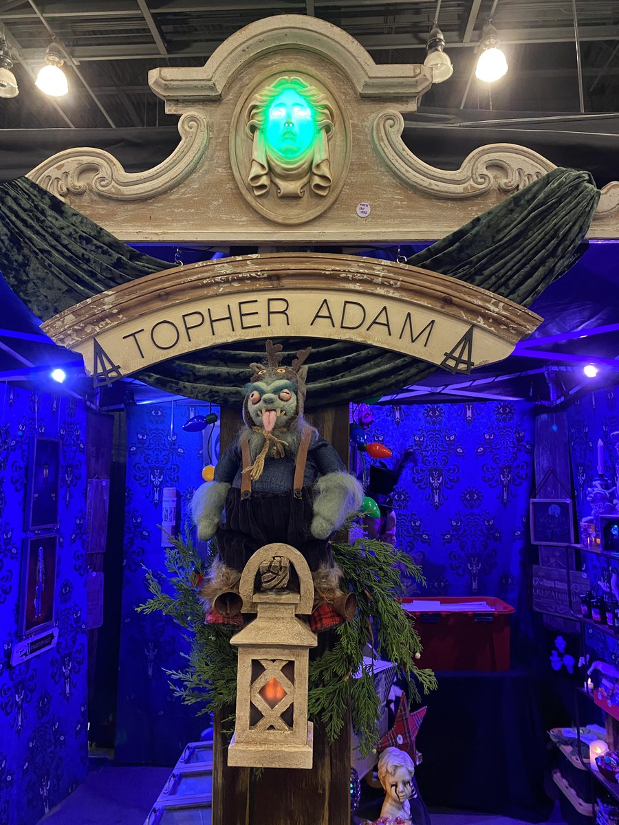 laughingplace's tweet photo. #TopherAdam has another booth with art heavily inspired by #TheHauntedMansion. #SeasonsScreamings @MidsummerScream https://t.co/lbzvpBteW6