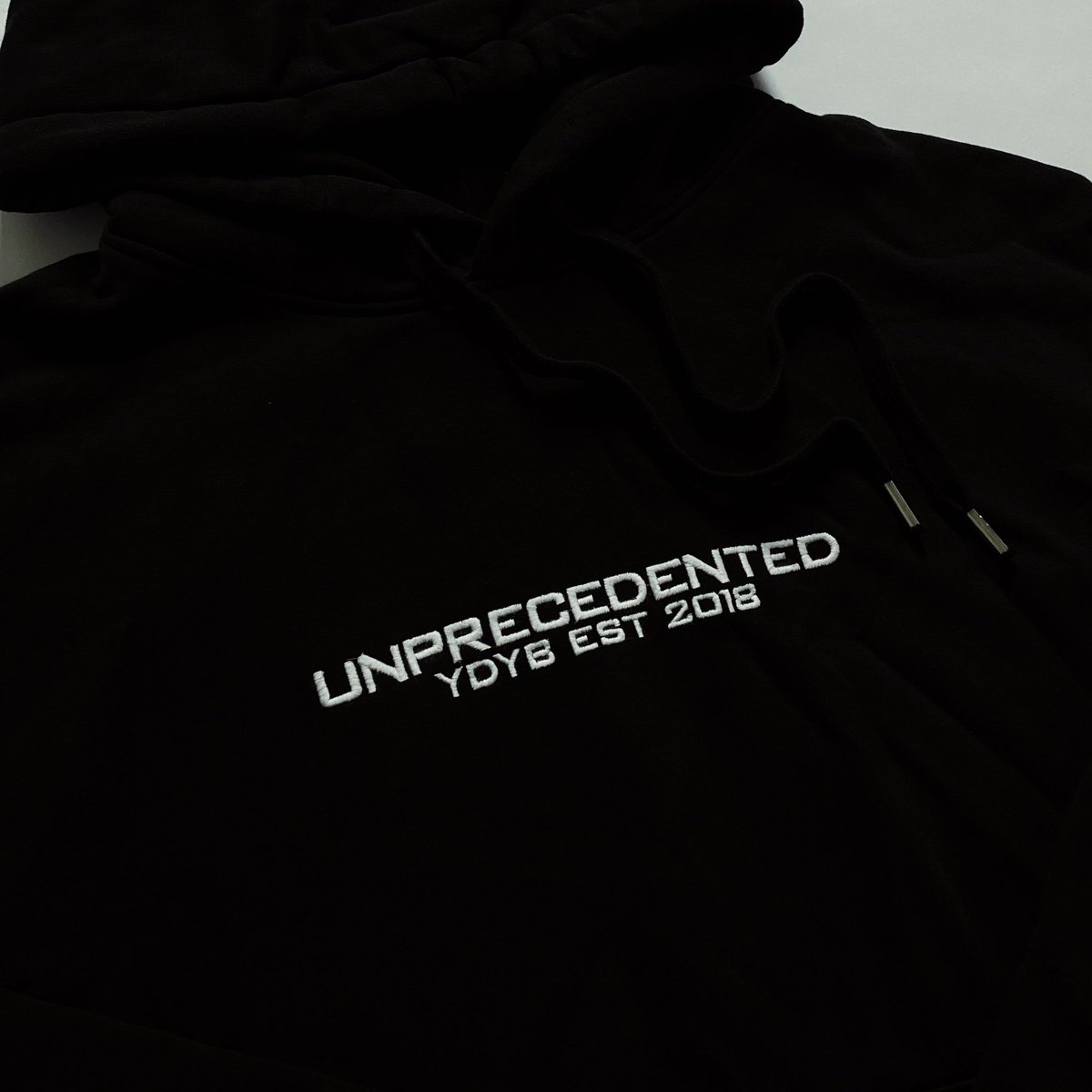 YDYBSHOP's tweet photo. “UNPRECEDENTED” oversized hood with white + black embroidery 🌏 https://t.co/h5ReTdshlF