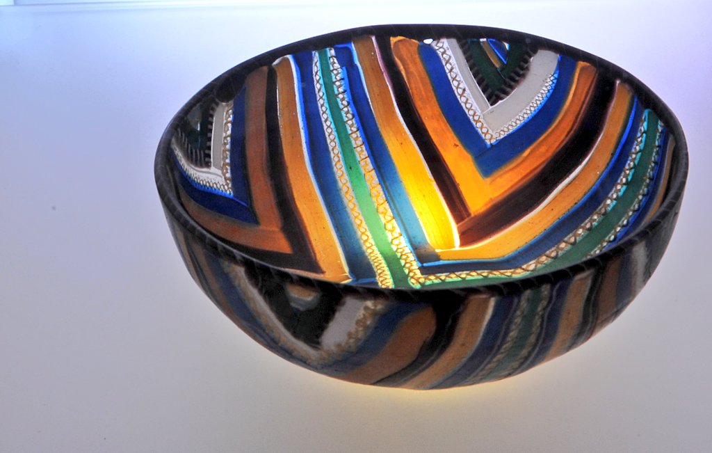 DrNWillburger's tweet photo. Fascinating world of ancient #glass: A magnificent #Roman striped mosaic bowl, made of preformed rods and canes fused on or in mold. Timeless beauty!

Dating late 1st BC–early 1st AD, found in Cuora, Cavarzere, Italy
Photo: Museo Archeologico Nazionale di Adria

#RomanArchaeology https://t.co/PACqPb6h0q