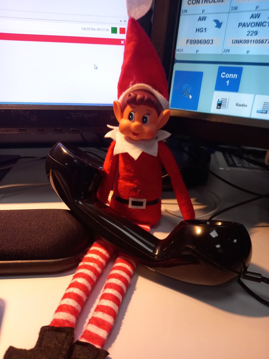 AFRSControl's tweet photo. Red watch are on duty today and Elfis is back in the Control Room for the festive season! 

#christmas #elfis #elfontheshelf2022 #AFRS https://t.co/R7SsWddhq4