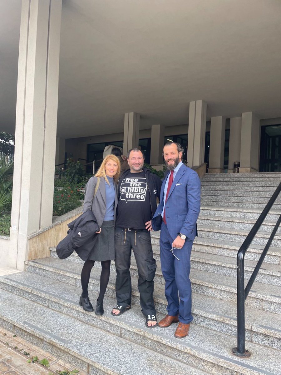Francesca Cancellaro, Dariush Beigui & Nicola Canestrini.<br>Dariush trägt ein 'free the el hiblu three' Shirt.<br><br><= “We are astonished by what happened today in the office of the Prosecution in Trapani. It has never happened to us before to not be able to sign the minutes of an interrogation. The minutes did not reflect the statements that we had made, so we asked the prosecutor to correct and the prosecutor denied, therefore we had to refuse the signature.” Nicola Canestrini, lawyer of the defense.<br><br>Dariush Beigui, iuventa: „I don’t trust the investigative authorities to be willing and able to ensure that my rights are respected. How could I if they even fail to respect their own rules and regulations?”<br><br>Now it is up to the court in Trapani to decide how to deal with these events.<br><br>For background information please download the PRESS KIT or visit our WEBSITE! Forfurther requests, interviews and statements please contact us: press@solidarity-at-sea.organd Phone: +4917623643117<br>[3/3]