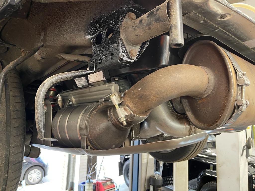 SterlingMess's tweet photo. I’m so pleased with the new standard exhaust set up. Note welded chassis rail end too. The 964 still sounds amazing on song, and there’s good news to follow regarding the Motronic fault code… https://t.co/oLcRQxhJyq