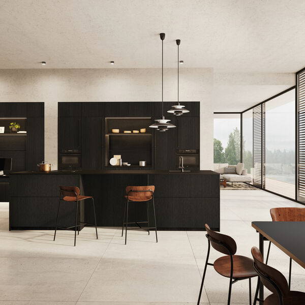 Rotpunkt creates beautiful, minimalist designs. take this luxurious kitchen in Loft Black Oak. The textured doors give the monochrome look depth, without it looking fussy. Visit our showroom today to see our Rotpunkt display and discuss your new kitchen. #Horsham #HaloInteriors