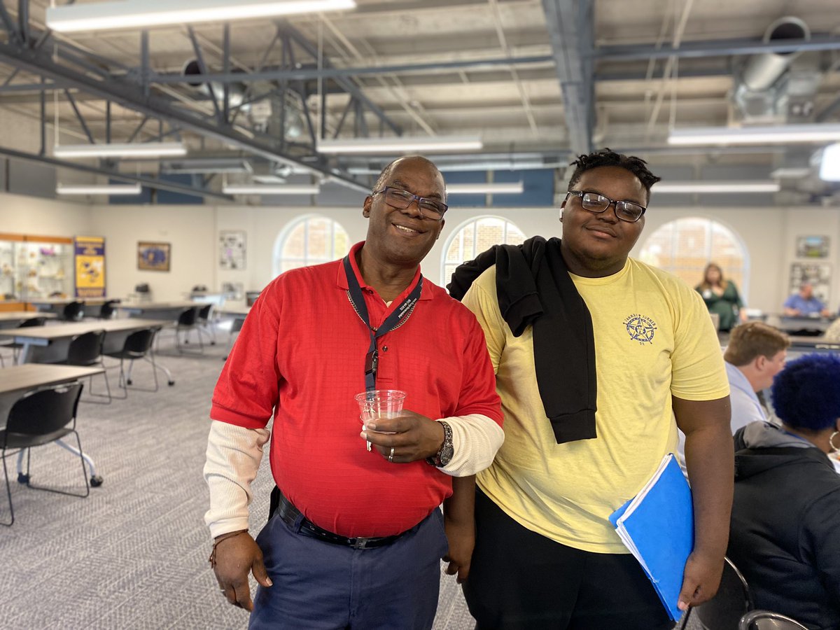 Students and staff enjoy a holiday meal together
