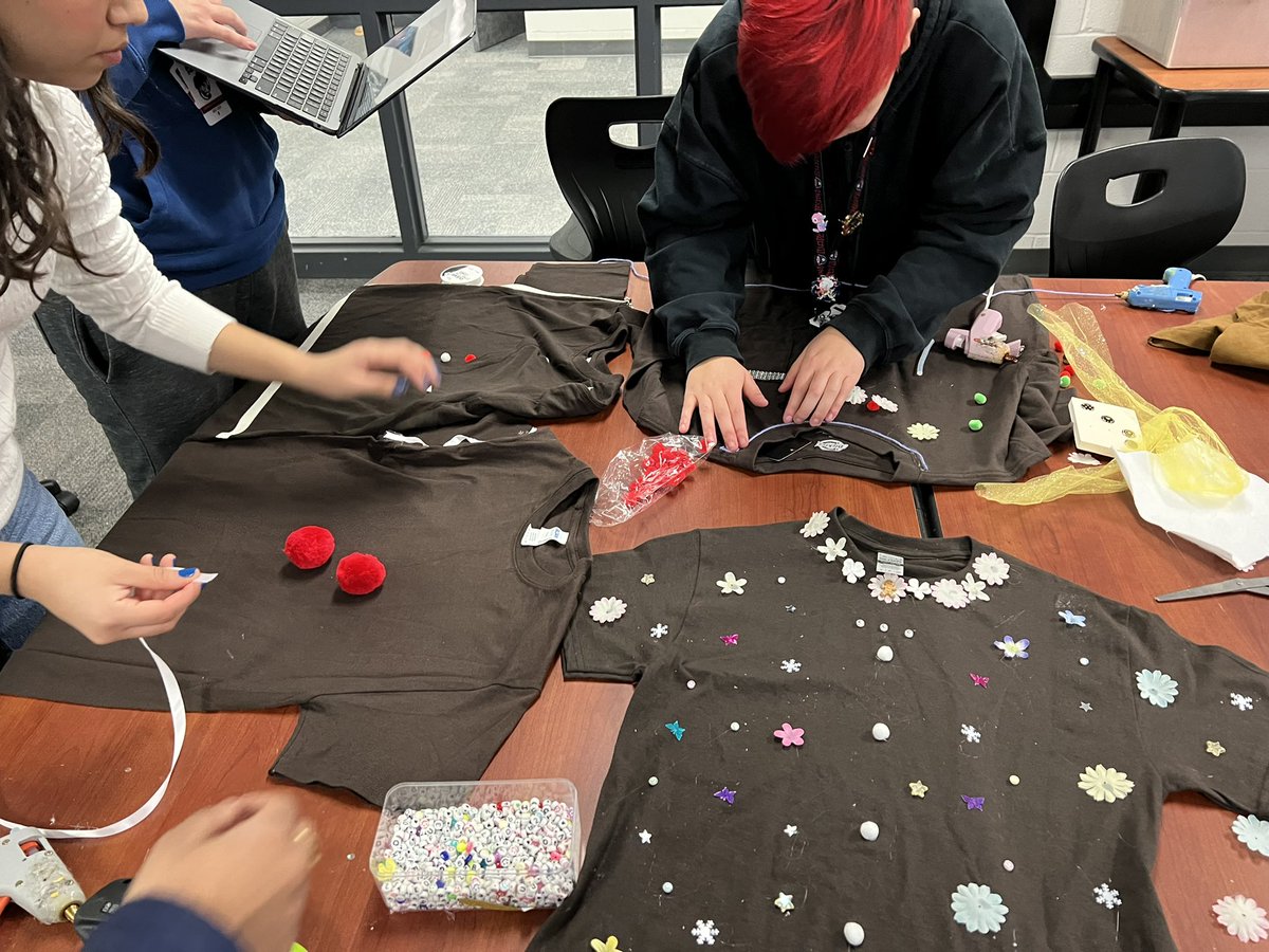 stuco_newtech's tweet photo. LLCs decorating shirts for the Coppell Christmas parade later today! Can you guess what our theme is? 🍪🌲✨ #NTHCinspire #LearnerLeadershipCouncil https://t.co/twBBAwlW3E
