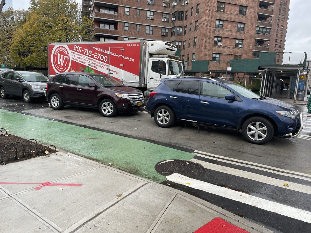 Daylight for pedestrians eclipsed by cars at Grand &amp; Sml Dickstein Plaza. <a href="/NYC_DOT/">NYC DOT</a> <a href="/NYPD7Pct/">NYPD 7th Precinct</a>