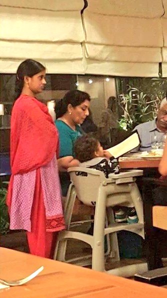 rose_k01's tweet photo. Upper class culture of Renuka Chowdhury. Domestic Help standing in attendance while family dines https://t.co/JtBK6H98ai
