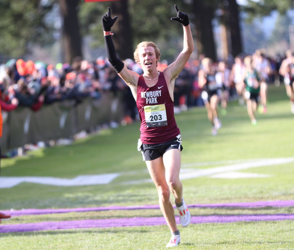 Aaron Sahlman of <a href="/NPHSXC/">NPHS Panthers Cross Country</a> wins NXN in a time of 14:45.5