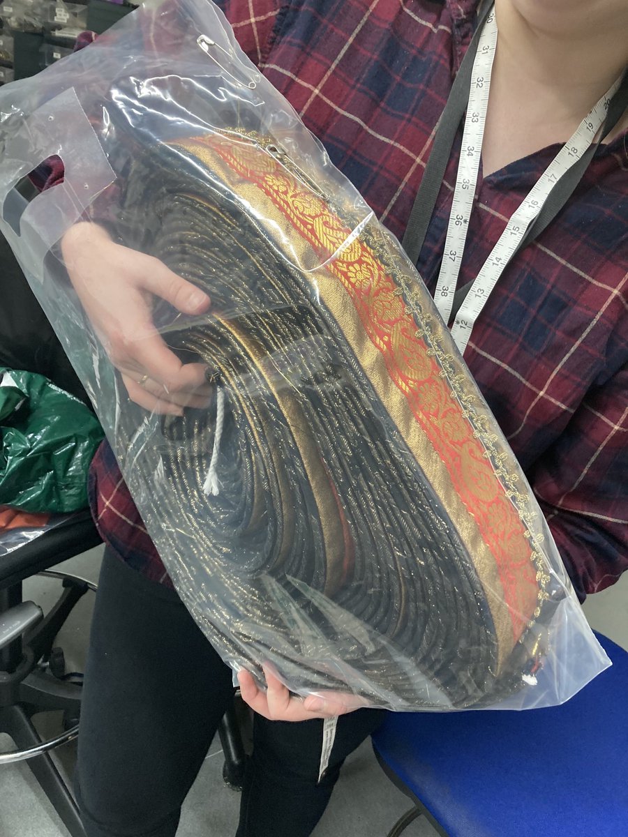 Daisy is making a set of Red Death rosettes. There are 6 different sections attached to over 12 metres of ribbon for one Phantom’s costume