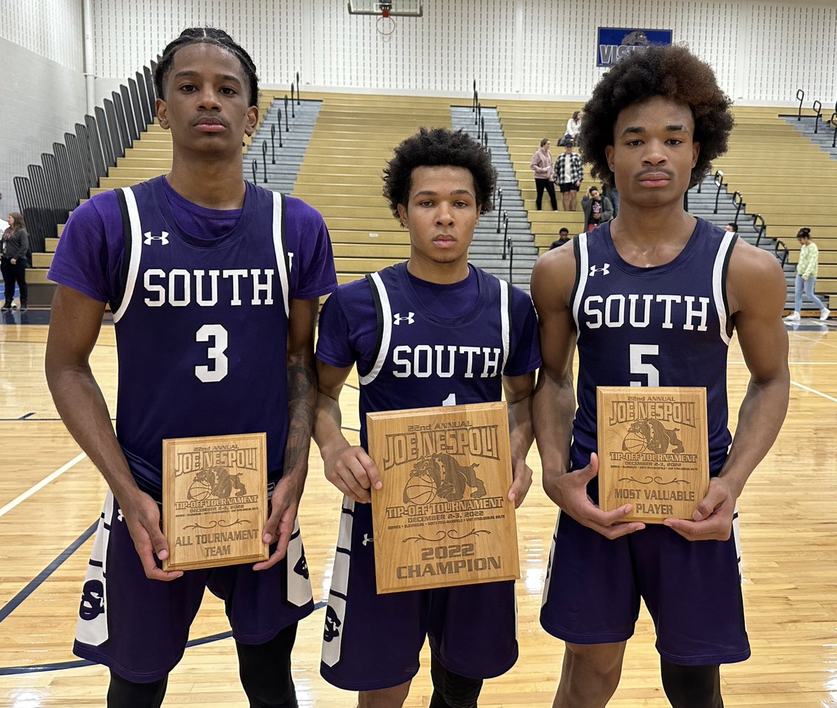 Bringing home the hardware…Santos with All Tournament Team Honors, Patterson with the Tournament trophy and Chatman with Tournament MVP honors.