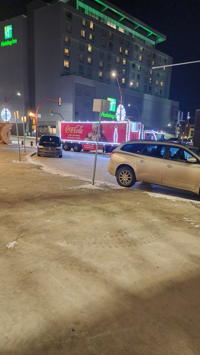 LADIDA83's tweet photo. #CocaCola Santa truck sighting in front of #TCUPlace in Saskatoon. https://t.co/InNOVOogBi