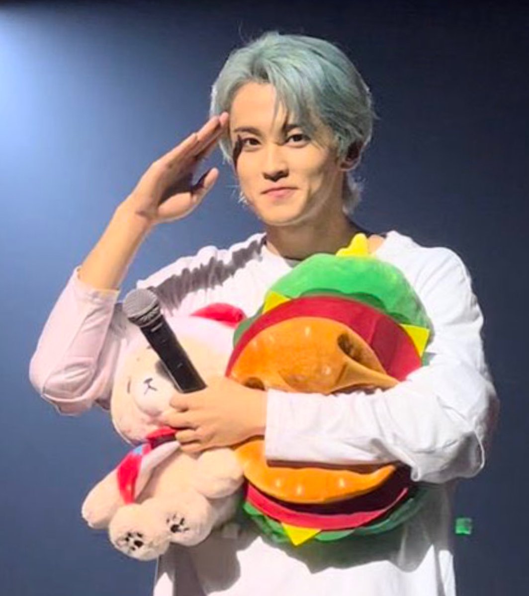 mark hugging a cheetah lee doll :(