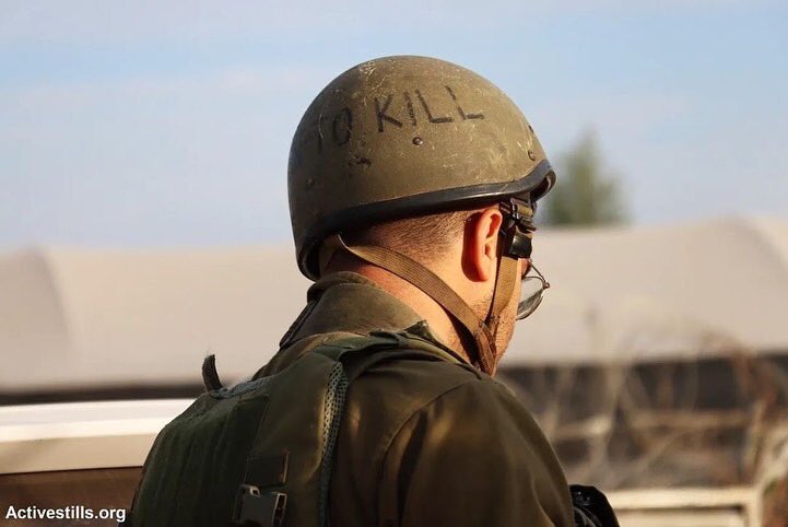 Timesofgaza's tweet photo. “Born to kill”
Attached are pictures for an lsraeli soldier at a checkpoint in Qalqilya wearing a helmet   with the slogan ‘born to kill’ written on it, reflecting a mentality that is widely embraced among the lsraeli occupation soldiers and proven by their actions. https://t.co/UqODRXghXV