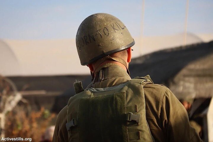 Timesofgaza's tweet photo. “Born to kill”
Attached are pictures for an lsraeli soldier at a checkpoint in Qalqilya wearing a helmet   with the slogan ‘born to kill’ written on it, reflecting a mentality that is widely embraced among the lsraeli occupation soldiers and proven by their actions. https://t.co/UqODRXghXV
