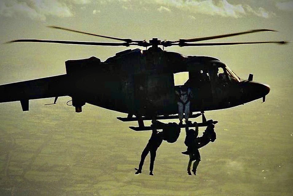 Above - In the door way in white hanging from a Westland Lynx, SAS blades prepare to leap into the void on a low-level insertion. 
#SAS #WHOSDEARSWINS #UKSF22 #HELLJUMPERS