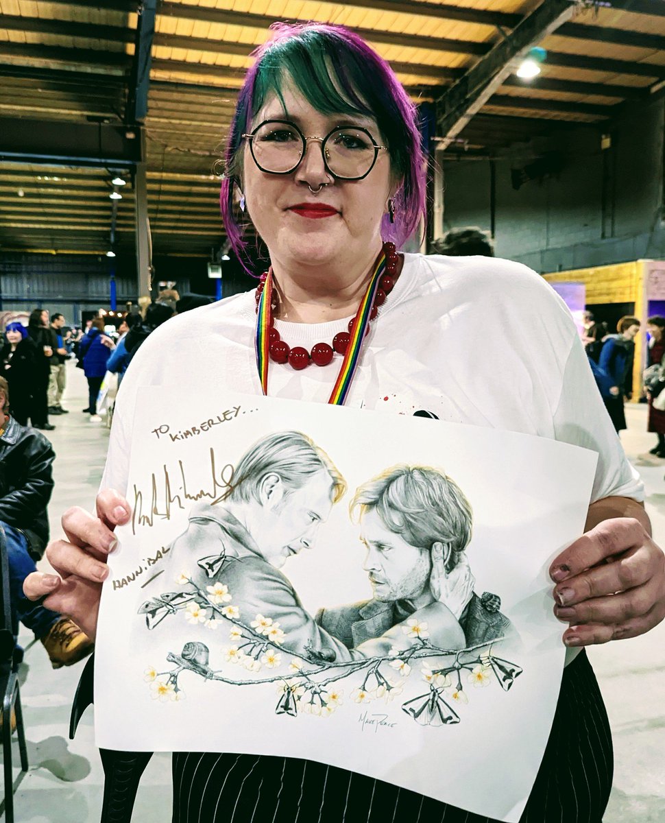 PetrychorDreams's tweet photo. Had my beautiful @amandamakepeace Hannigram piece signed by Mads. He really likes it! He remembered seeing @shaybeenerd's yesterday :) 

#MadsInManchester #MadsMikkelsen #ManchesterLovesMads #fortheloveofscifi2022 https://t.co/T07anDQNOc