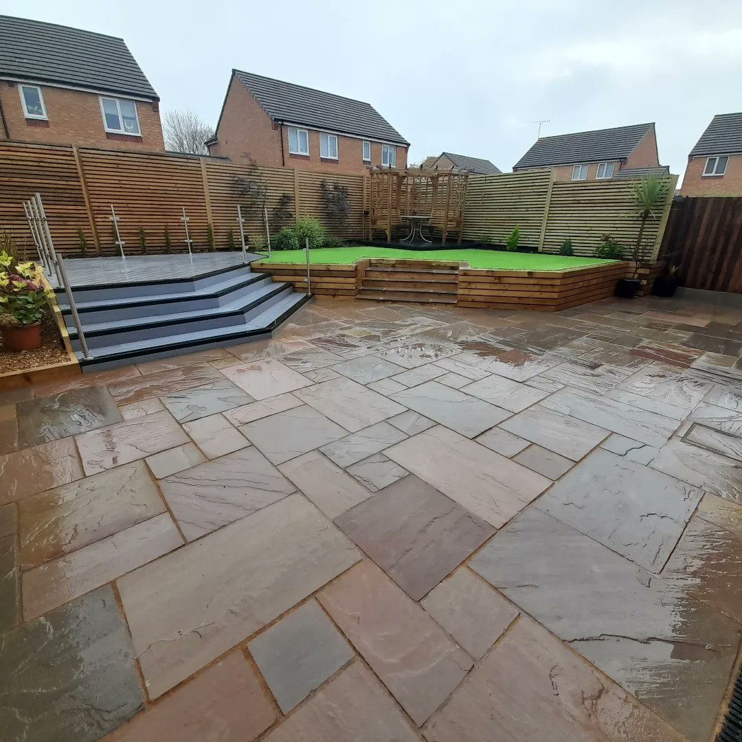 pimcoagl's tweet photo. The new larger Indian stone patio leads to a sleeper wall to the new elevated grass area. 
The composite decking had a glass Balustrade fitted and new fencing to finish off the garden. 
#teampimco #artificialgrass #grass #LAWN #sleepers #woodwork #carpentry #compositedecking https://t.co/UwMOvTJqOZ