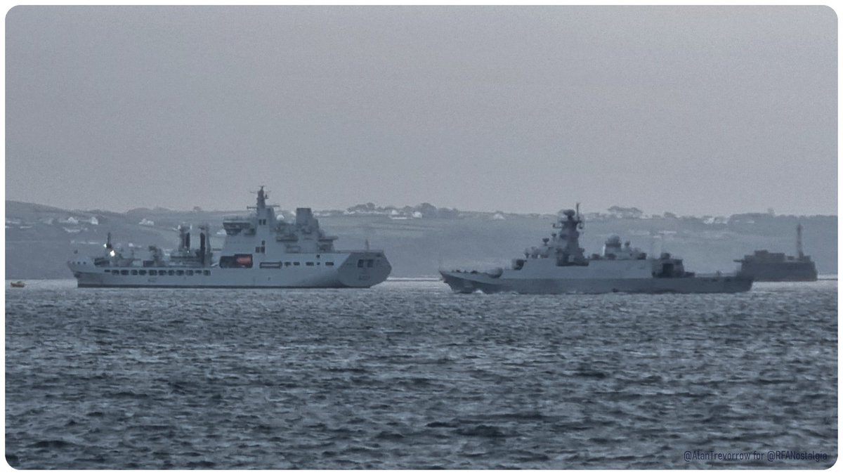 A cold, dull day greets an unusual visitor to @HMNBDevonport ... seen here passing @RFATiderace Phot: Tbx @alantrevorrow