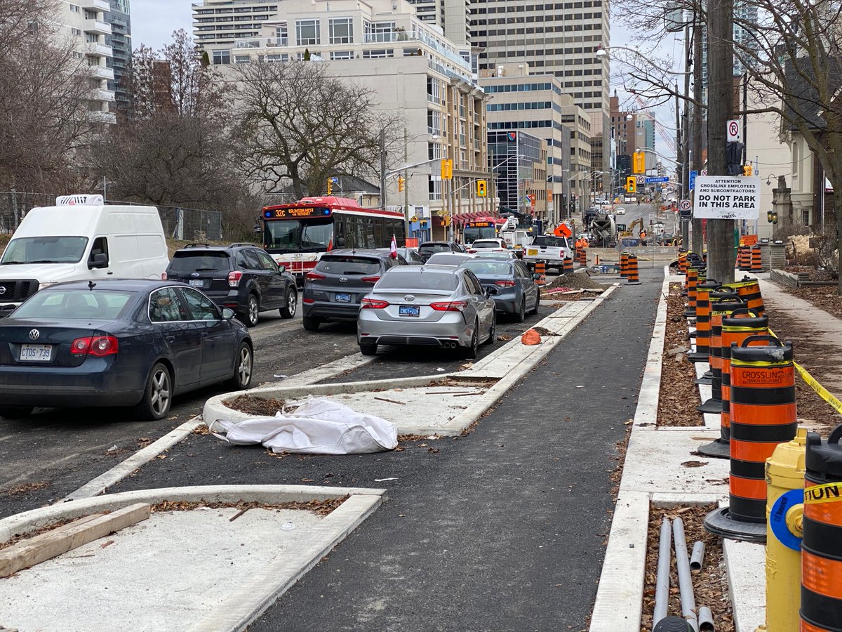 Separated bike lanes under construction on Eglinton (Toronto)!