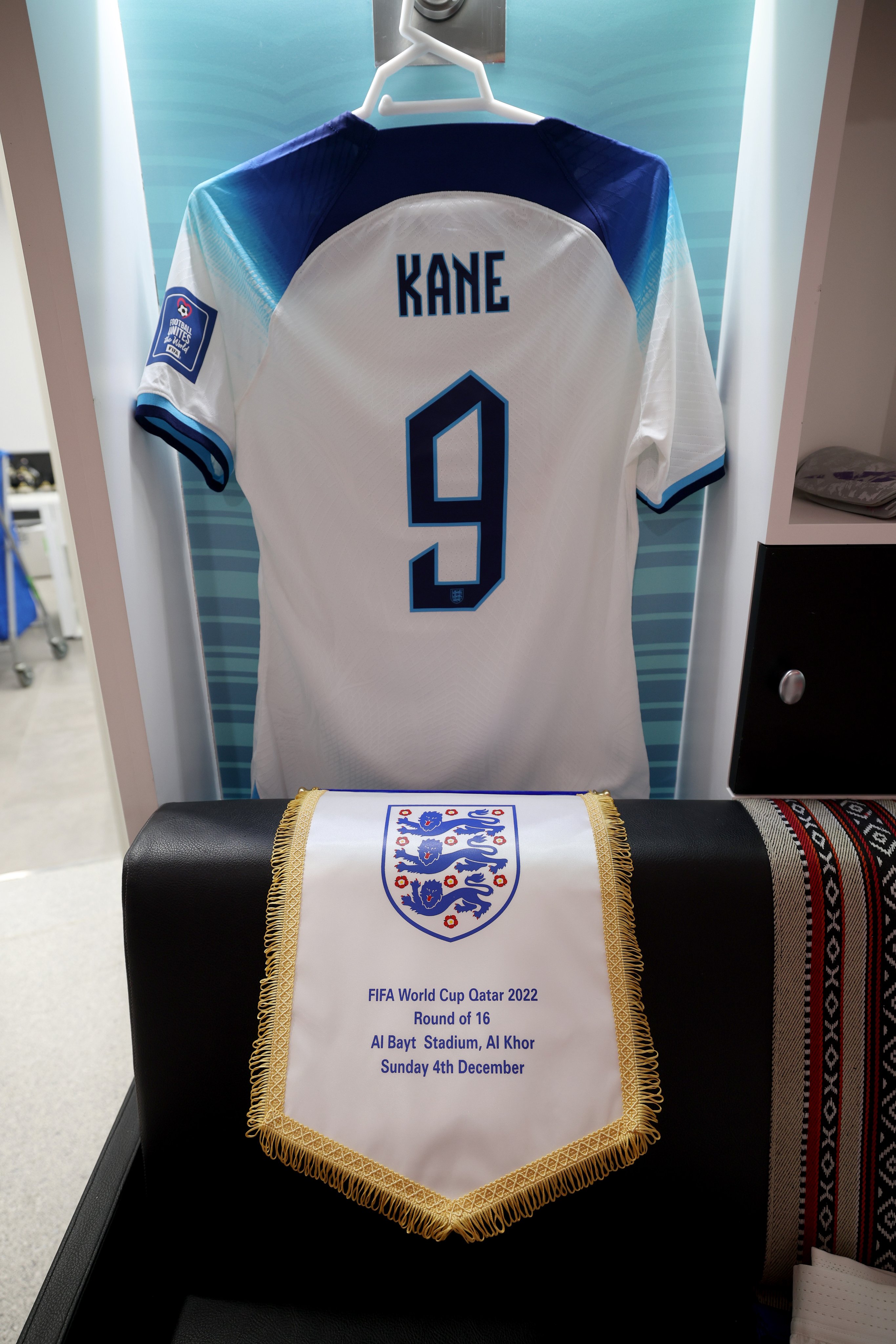 Harry Kane's shirt and pennant inside the England dressing room.