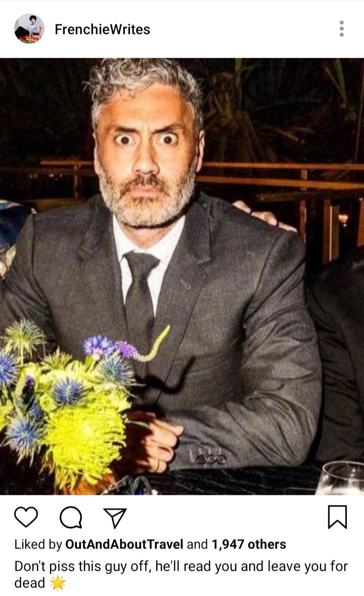 Frenchie IG : picture of Ed in suit at a table with flowers. Caption reads "don't piss this guy off, he'll read you and leave you for dead 🌟