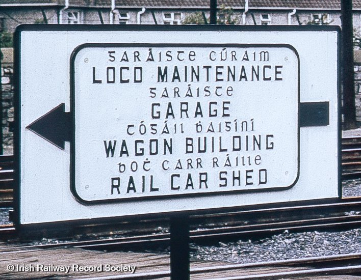 irishrailways's tweet photo. Railway terminology wonderfully translated into the old Irish language script; CIÉ's Inchicore Works, Dublin (kodachrome 35mm slide, Sept 1964) 🚂🛠️#ExploreYourArchive #EYALanguages @explorearchives https://t.co/U0hld6XL4C