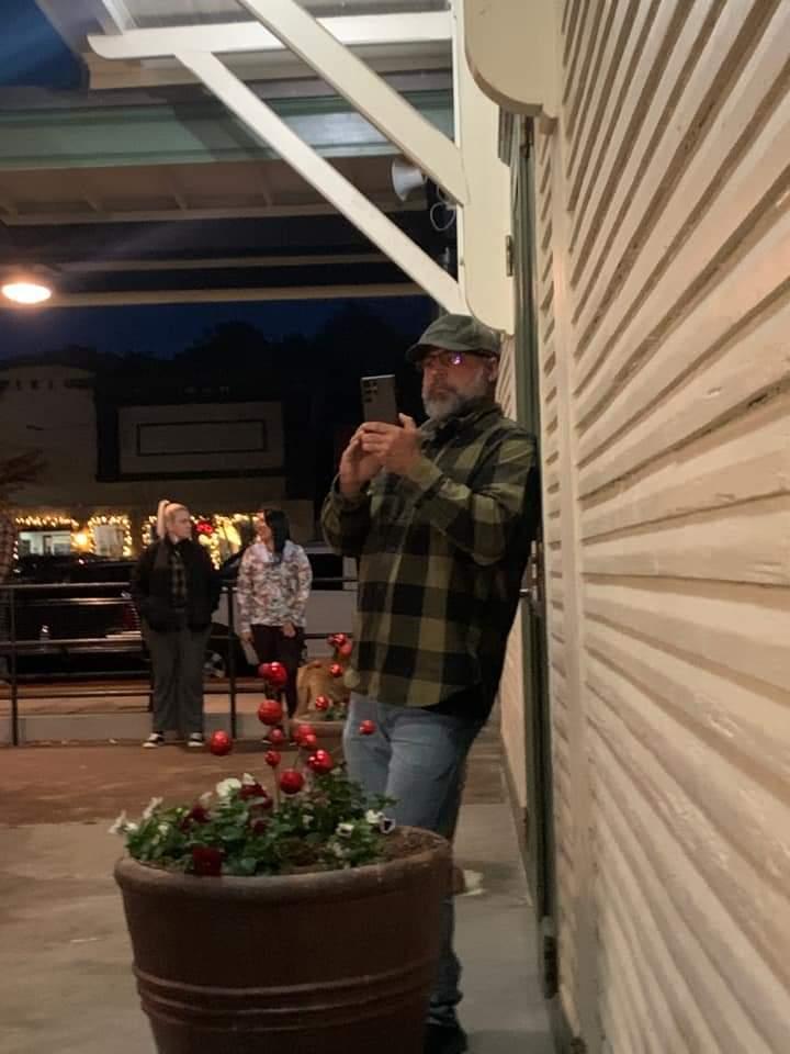 On the left is Emily Grace in Blue with the Proud Boys outside the drag story hour a few weeks back in Sanford NC. The guy with the hat and flannel shirt was there and outside the Sunrise theater with the same outfit filming people in Moore County last night. Anyone have an ID?