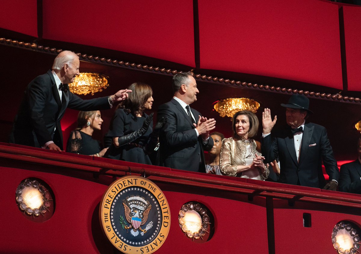 President Biden points to Paul Pelosi, seen wearing a hat and glove as a result of the hammer attack in his home, during the Kennedy Center honors gala. 📷 <a href="/reuters/">Reuters</a>