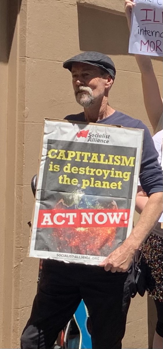 knitnannasSYD's tweet photo. Huge loud protest outside NSW Parl today, in support of Violet Coco. Perrottet says it’s ‘pleasing to see’ her harsh sentence of 15 months jail for blocking 1 lane of Harbour Bridge for 25 mins to draw attention to our looming climate catastrophe. https://t.co/dEokXQMwLR