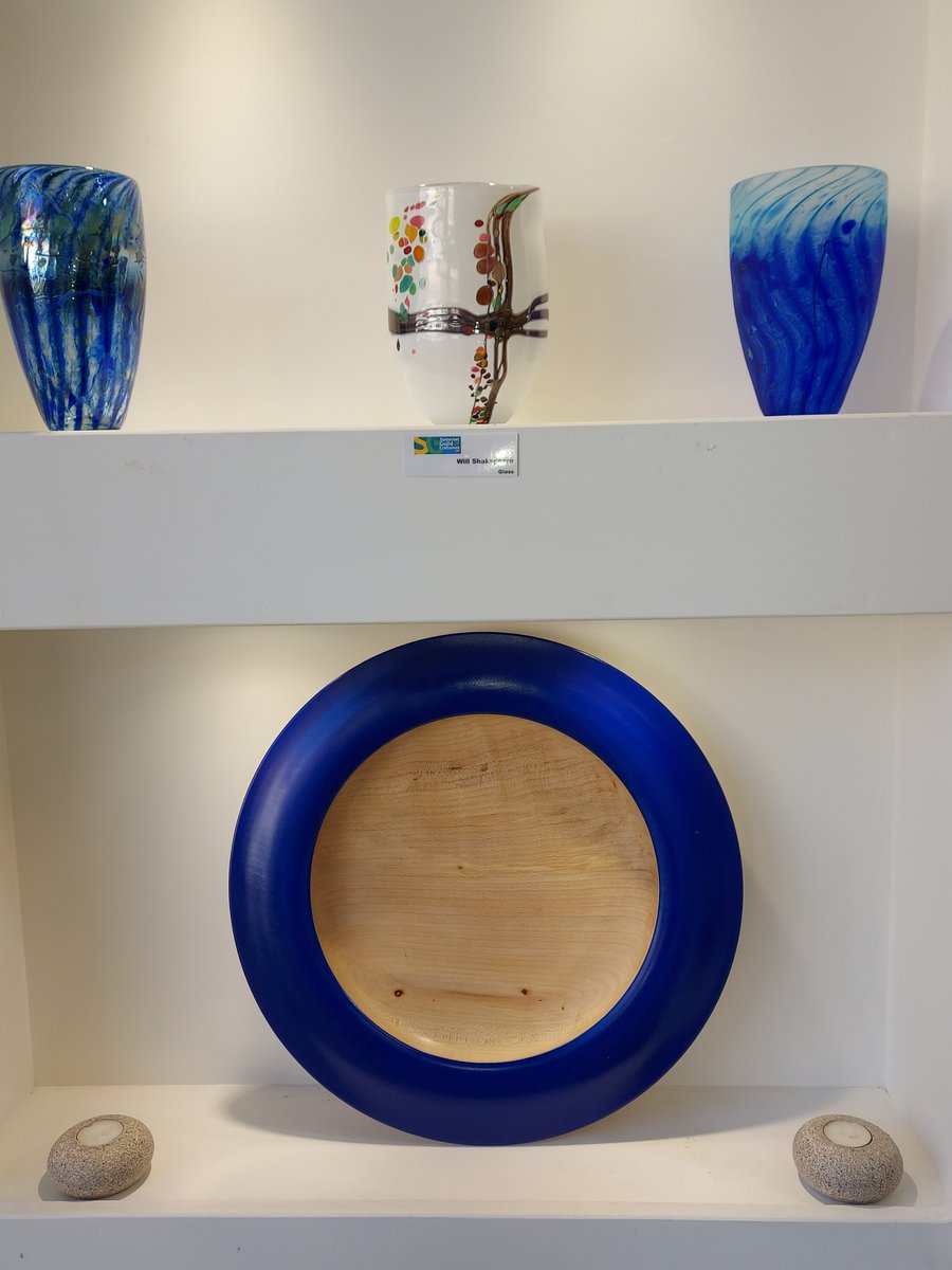 Lovely new work in the Guild gallery from Shaun Stacey &amp; Will Shakspeare. Shaun’s cobalt blue-edged Ash platter looks splendid alongside Will Shakspeare's traditionally mouth-blown glass. Stunning pieces from both makers available to view now. Open Mon-Sat 10-4 until Christmas.
