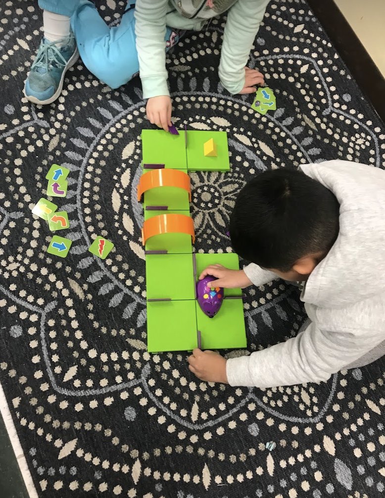 2hawks214's tweet photo. #BPSCoders 2nd graders @HInclusion having fun with Code & Go Robot Mouse @BostonSchools https://t.co/ay42XpodlH