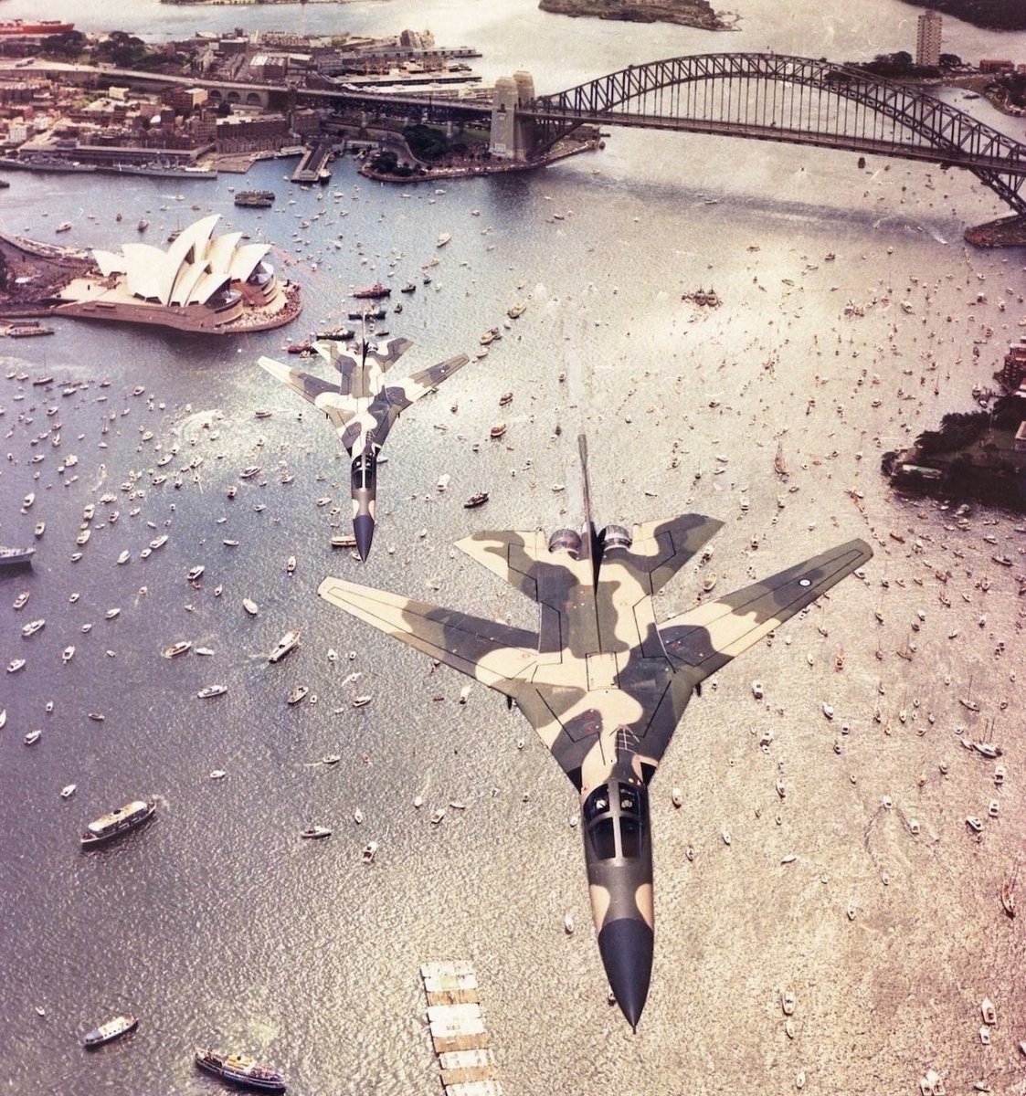 RAF_Luton's tweet photo. Photo of the Day: A Tornado F3s (small) and F3L (Large) fly over the Tyne Bridge and Sage music venue in Sunderland where Geordies gather to celebrate the annual Fog on the Tyne festival starring local Mackem legend Jimmy Nail

Photographed from a Canberra https://t.co/lFFcyNnL6z