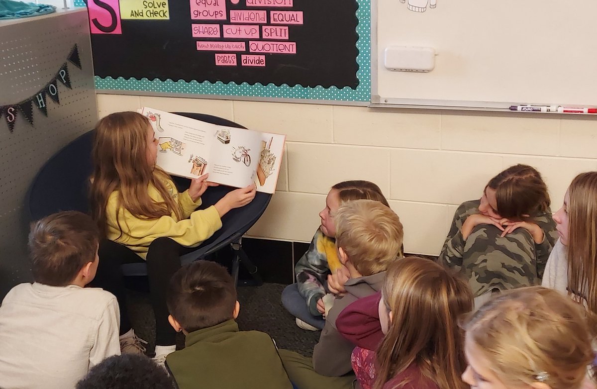 Ss sharing their favorite book with the class. 📚#gogulllake #glcsryan