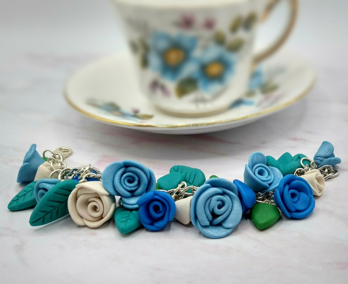 WTFcharms's tweet photo. Chunky rose charm bracelets https://t.co/BxVcA5UtAu