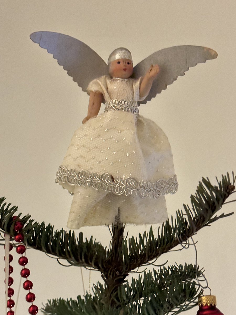 <a href="/CBCHereandNow/">CBC Here and Now</a> this angel tops one of the three trees in my house. It was my grandma’s ornament when she was little. The dress and wings were replaced sometime back in the 70’s. It must be close to 100 years old by now. It warms my heart every time I put it on my tree.
