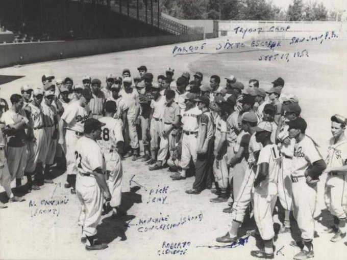 baseballinpix's tweet photo. Dodgers holding tryouts in Puerto Rico  for local players including bottom right of the photo wearing a #12 on his back - 18-year-old Roberto Clemente, Sept 17, 1952. https://t.co/uIUS7rL2UK