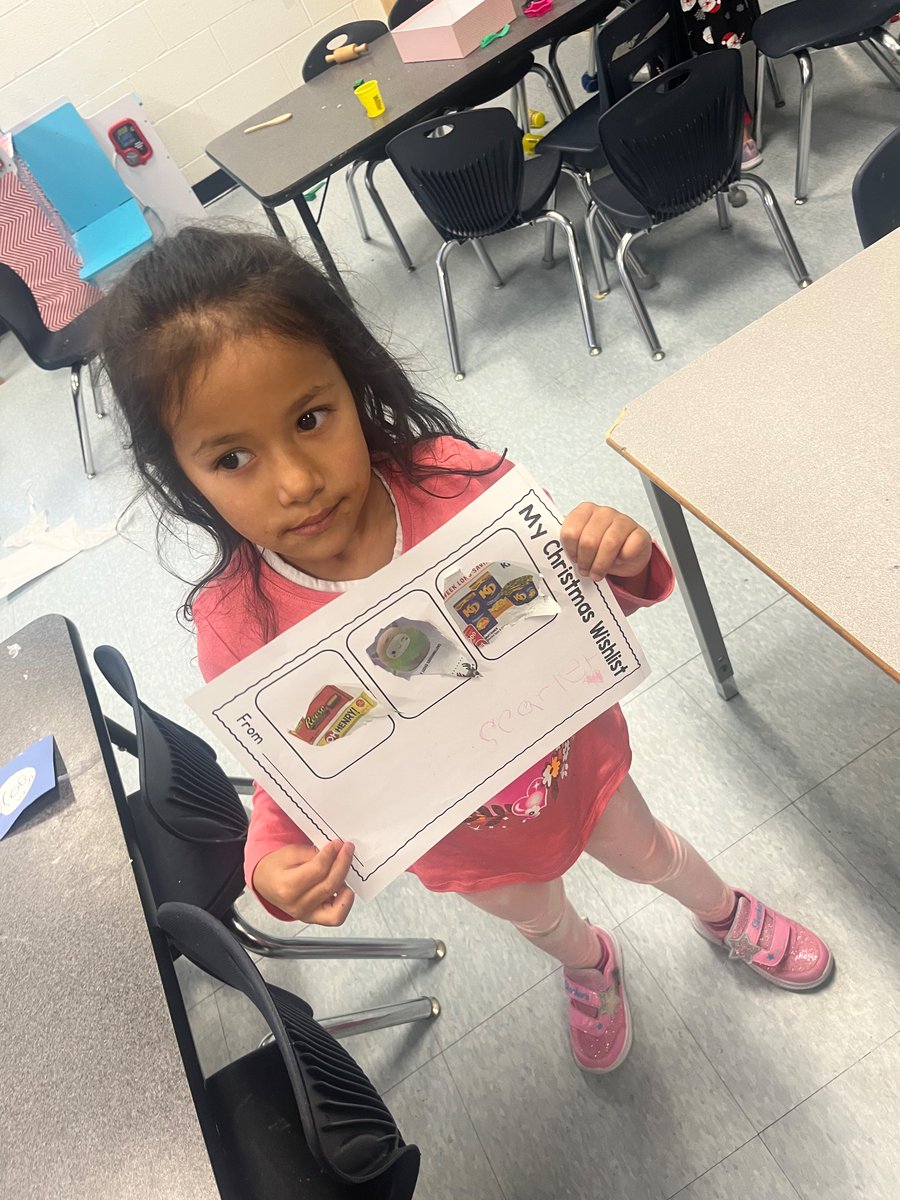Getting in the Christmas spirit by decorating trees, reading by the tree, making lists for Santa and making toys in his workshop. <a href="/alcdsb_pett/">St. Peter Trenton</a>