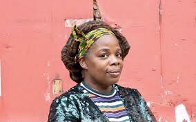 RogerHelmerMEP's tweet photo. A woman born in Britain decides to celebrate her African heritage by adopting an African name, African hair &amp; African dress. She then throws a wobbly when someone assumes she’s African. Do I sense an agenda here? https://t.co/RNW3ChuBJ5
