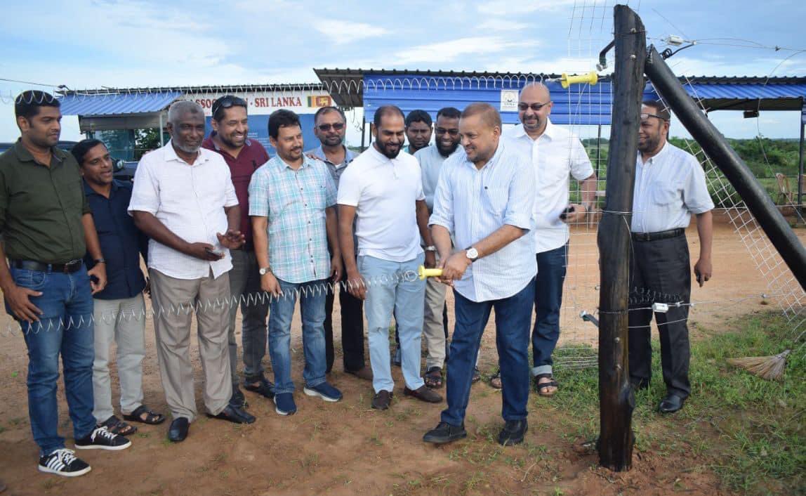 NMASriLanka's tweet photo. Work on the installation of a protective electric fence at the #COVID19 burial ground at Majma Nagar Ottamavaadi in Batticaloa commenced on 4/12/22. The NMA was represented by Vice Chair Mr. Afzal Marikar, Members Mr. Aman Ashraff and Mr. Suhail Jamaldeen.

#NMA #SriLanka #lka https://t.co/nKrR0ZN9vV