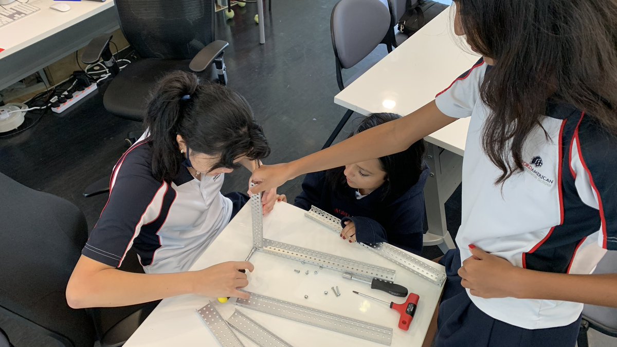 NoahkahanTours's tweet photo. #SAISRobotics all female team putting together their chassis, gr 9 team assembling their drive & figuring out the coding and the senior team totally rebuilding their silver medal robot! #InnovationCenter is a hub for robotics at lunch and after school #Vex https://t.co/MQgPJhae2P