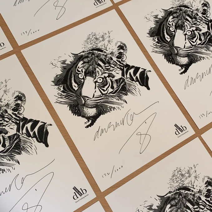 Prints with a black-and-white illustration of the Tyger's face. A child's hand is stroking her forehead. The print is signed by SF Said & Dave McKean.