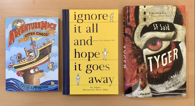 A row of books: Adventuremice: Otter Chaos, Ignore it All and Hope it Goes Away, and Tyger.