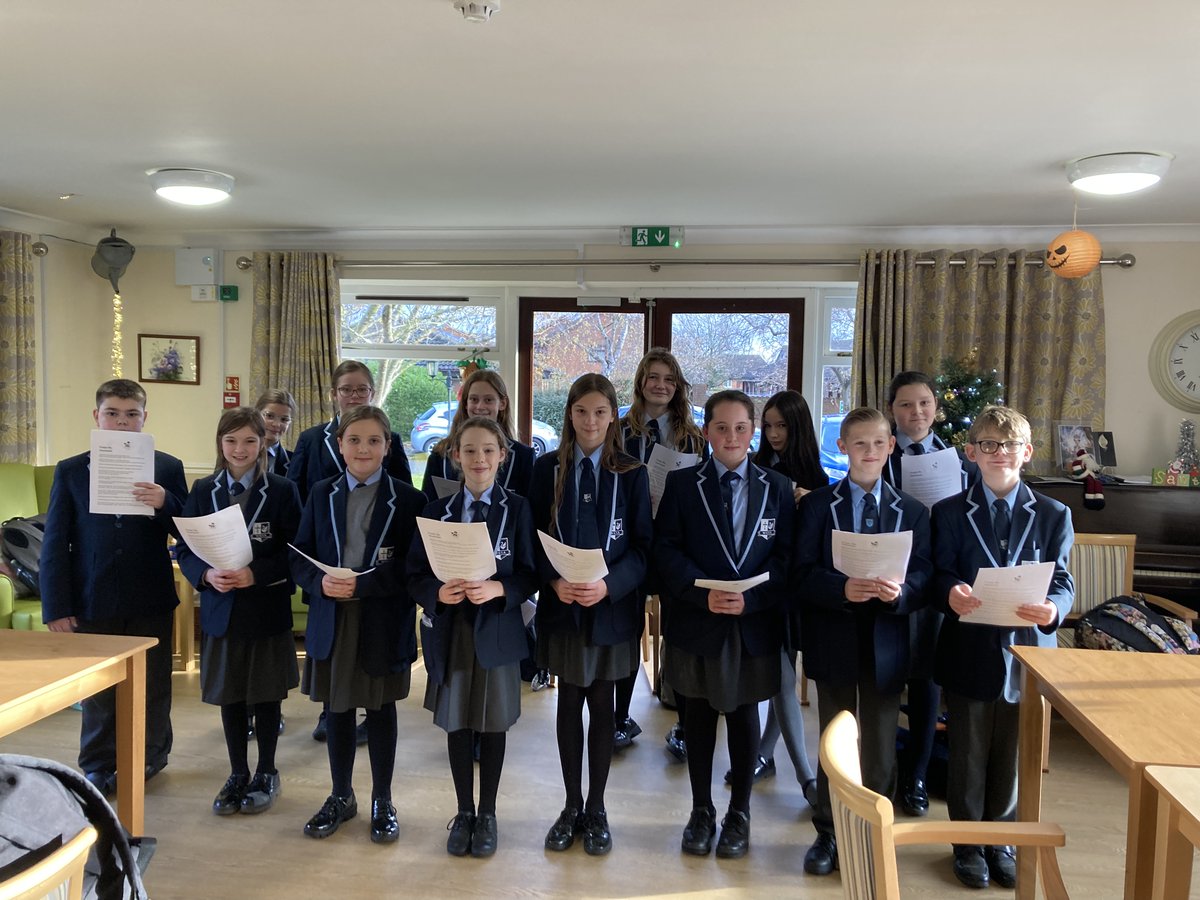 WGSecondaryAcad's tweet photo. Students have gathered to sing Christmas carols and bring festive cheer to the residents of Red Court Care Community. The students presented the residents with crocheted blankets made by the Academy’s ‘Wool Warriors’ enrichment group and handmade Christmas cards. https://t.co/s69bprmF4M